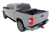 Load image into Gallery viewer, Hard Tri-Fold Flip Up Bed Cover | 5'7" Bed | Toyota Tundra 2WD/4WD (07-21)