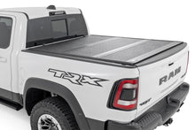 Load image into Gallery viewer, Hard Low Profile Bed Cover |6'4" | No Rambox | Ram 1500 (19-26)/1500 TRX (21-24) 