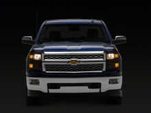 Load image into Gallery viewer, Raxiom 14-15 Chevrolet Silverado 1500 OE Style Headlights/ Black Trim- Black - Clear Lens