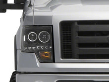 Load image into Gallery viewer, Raxiom 09-14 Ford F-150 G2 Super White LED Halo Projector Headlights- Black Housing- Clear Lens