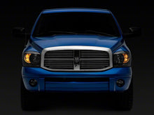 Load image into Gallery viewer, Raxiom 06-08 Dodge RAM 1500 Axial Series Euro Headlights- Black Housing- Clear Lens