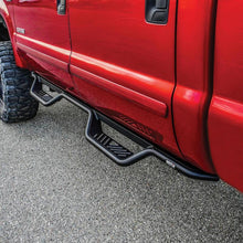 Load image into Gallery viewer, Westin 1999-2016 Ford F-250/F-350/F-450/F-550 Crew Cab Outlaw Drop Nerf Step Bars Textured Black