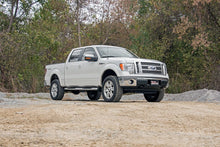 Load image into Gallery viewer, 2 Inch Lift Kit | M1 Struts/M1 | Ford F-150 4WD (2009-2013)