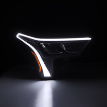 Load image into Gallery viewer, AlphaRex 22-23 Toyota Tundra LUXX-Series Headlights Black w/White DRL - Req 810029 OR 810030