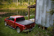 Load image into Gallery viewer, UnderCover 19-20 Ram 1500 6.4ft SE Bed Cover - Black Textured