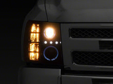 Load image into Gallery viewer, Raxiom 07-13 Chevrolet Silverado 1500 LED Halo Projector Headlights- Black Housing- Clear Lens