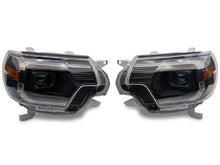 Load image into Gallery viewer, Raxiom 12-15 Toyota Tacoma Axial Series Switchback Projector Headlights- Black Housing- Clear Lens