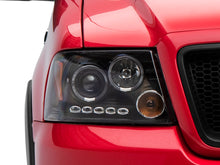 Load image into Gallery viewer, Raxiom 04-08 Ford F-150 Dual LED Halo Projector Headlights- Black Housing (Clear Lens)