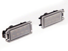 Load image into Gallery viewer, Raxiom 14-20 Jeep Grand Cherokee WK2 Axial Series LED License Plate Lamps