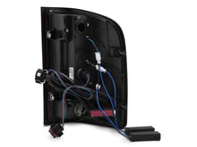 Load image into Gallery viewer, Raxiom 07-13 Chevrolet Silverado 1500 G2 LED Tail Lights- Black Housing- Smoked Lens