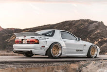 Load image into Gallery viewer, GReddy Pandem 85-92 Mazda RX-7 FC3S Headlight  Mounts from gre17040330