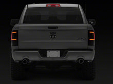 Load image into Gallery viewer, Raxiom 09-18 Dodge RAM 1500 Axial Series LED Tail Lights- Black Housing- Smoked Lens