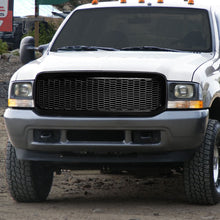 Load image into Gallery viewer, 99-04 Ford F-250 F-350 F-450 F-550 Honeycomb Mesh Front Grille - Black