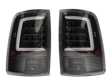 Load image into Gallery viewer, Raxiom 09-18 Dodge RAM 1500 Axial Series LED Tail Lights- Black Housing- Clear Lens