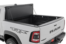 Load image into Gallery viewer, Hard Tri-Fold Flip Up Bed Cover | 6'4" | Ram 1500 (19-26)/1500 TRX (21-24) 