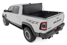 Load image into Gallery viewer, Hard Tri-Fold Flip Up Bed Cover | 6'4" | Ram 1500 (19-26)/1500 TRX (21-24) 