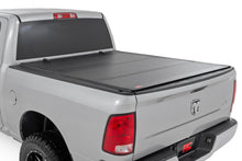 Load image into Gallery viewer, Hard Tri-Fold Flip Up Bed Cover | 6'4" Bed | Ram 1500/2500/3500 (10-26 &amp; Classic)