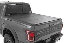 Load image into Gallery viewer, Hard Tri-Fold Flip Up Bed Cover | 5'7" Bed | Ford F-150 (21-26)/F-150 Lightning (22-26)