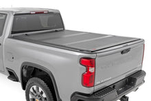 Load image into Gallery viewer, Hard Tri-Fold Flip Up Bed Cover | 6'9" Bed | Chevy/GMC  Silverado/Sierra 2500HD/3500HD (20-26)