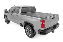 Load image into Gallery viewer, Hard Tri-Fold Flip Up Bed Cover | 6'9" Bed | Chevy/GMC  Silverado/Sierra 2500HD/3500HD (20-26)