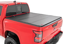 Load image into Gallery viewer, Hard Tri-Fold Flip Up Bed Cover | 5' Bed | Nissan Frontier 2WD/4WD (22-26)