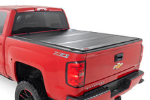 Load image into Gallery viewer, Hard Tri-Fold Flip Up Bed Cover | 5'9" Bed | Chevy/GMC 1500 (14-18 &amp; Classic)