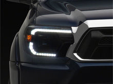 Load image into Gallery viewer, Raxiom 12-15 Toyota Tacoma Axial Series Switchback Projector Headlights- Black Housing- Clear Lens
