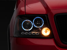 Load image into Gallery viewer, Raxiom 04-08 Ford F-150 Dual LED Halo Projector Headlights- Black Housing (Clear Lens)