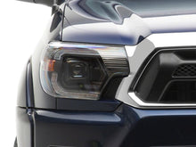 Load image into Gallery viewer, Raxiom 12-15 Toyota Tacoma Axial Series Switchback Projector Headlights- Black Housing- Clear Lens