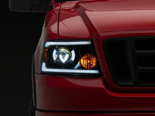 Load image into Gallery viewer, Raxiom 04-08 Ford F-150 Axial Series LED Proj Headlights/Seq LED Bar- Black- Clear Lens