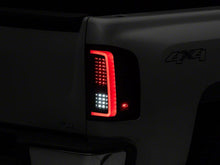 Load image into Gallery viewer, Raxiom 07-13 Chevrolet Silverado 1500 G2 LED Tail Lights- Black Housing- Smoked Lens