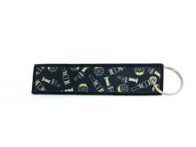 Load image into Gallery viewer, Yellow Speed Racing Jet Tag Keychain