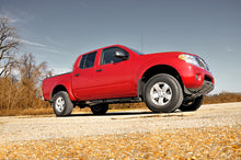 Load image into Gallery viewer, 2.5 Inch Leveling Kit | Red Spacers | Nissan Frontier (05-26)/Xterra (05-15) 